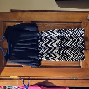 Size 4 black and cream/off white mini/midi dress like new only wore a few times